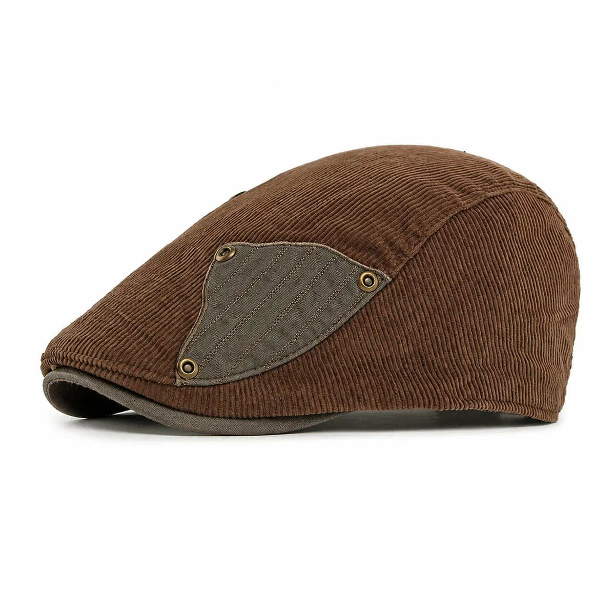Brown corduroy flat cap with a contrast side patch and metal eyelets, on a white background